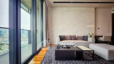 Luxurious modern living room with floor-to-ceiling windows and stunning city view.