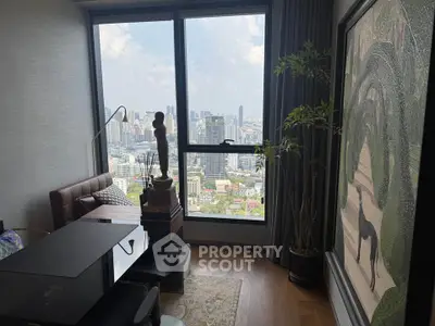Luxurious living room with stunning city view, elegant decor, and floor-to-ceiling windows in a high-rise apartment.