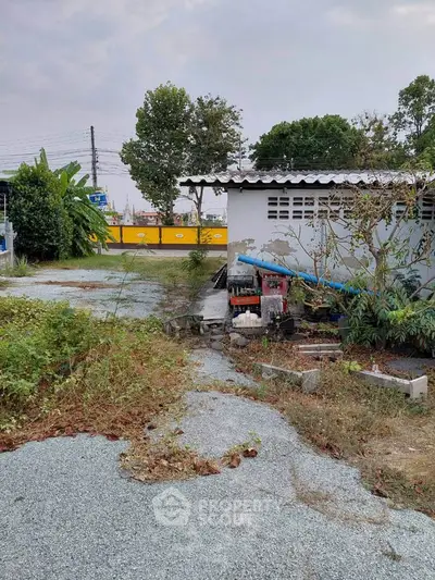 Explore potential with this fixer-upper property featuring a spacious outdoor area, perfect for renovation projects.