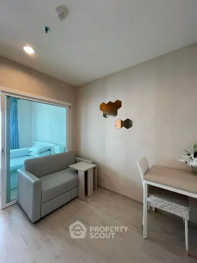 Modern living room with sleek sofa and stylish decor in a cozy apartment