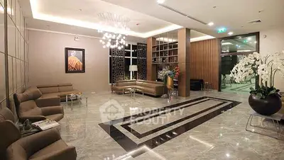 Luxurious modern living room with elegant decor and spacious seating area
