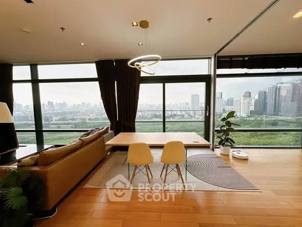 Luxurious living room with panoramic city view and modern decor
