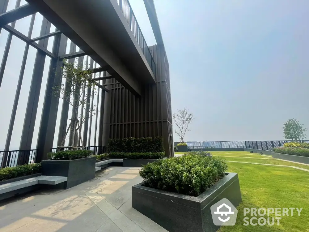 Stunning rooftop garden with modern design and lush greenery offering panoramic views.