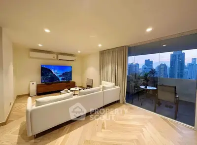Luxurious living room with city view and spacious balcony in modern apartment