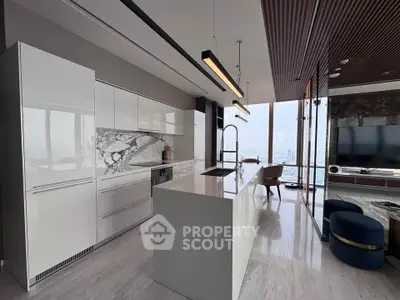 Luxurious modern kitchen with sleek design and stunning city view