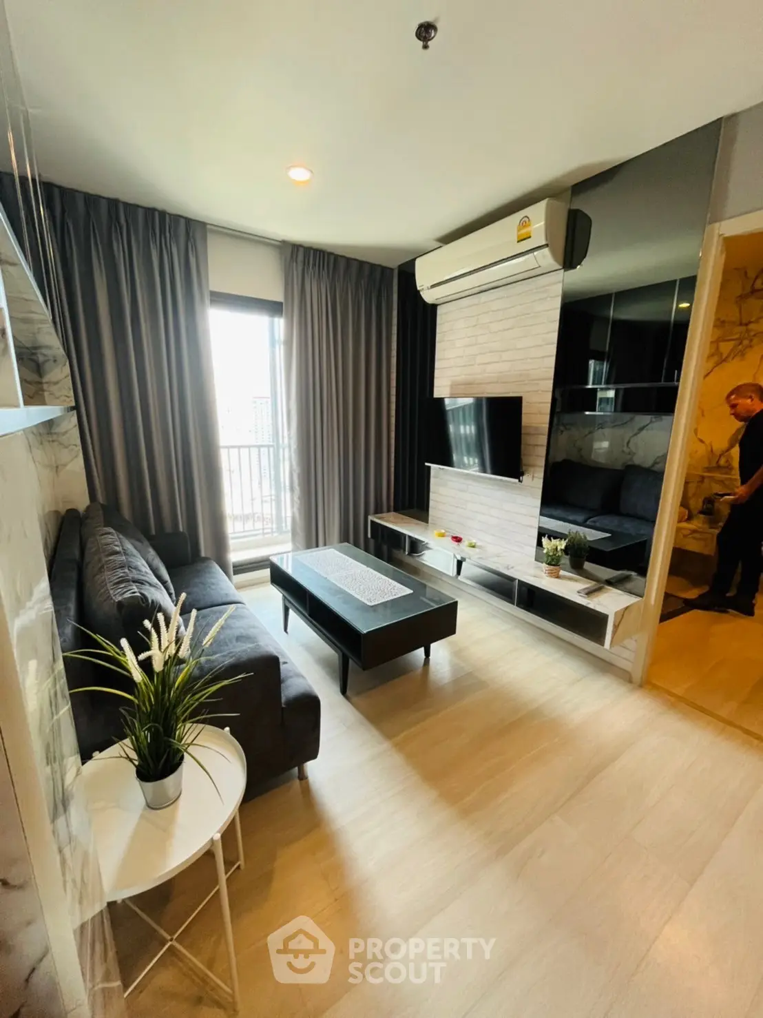 Modern living room with sleek design and city view