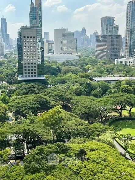 Stunning cityscape view with lush greenery and modern skyscrapers