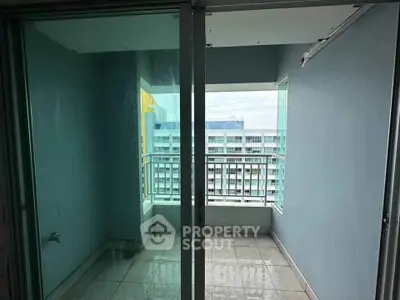 Spacious balcony with city view in modern apartment