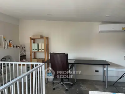 Modern study room with sleek desk and ergonomic chair, perfect for productivity.