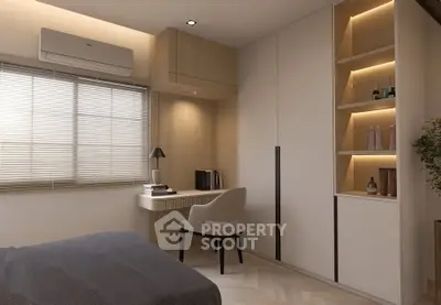 Modern bedroom with built-in shelves and cozy workspace