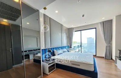 Luxurious modern bedroom with floor-to-ceiling windows and city view, featuring elegant decor and spacious layout.