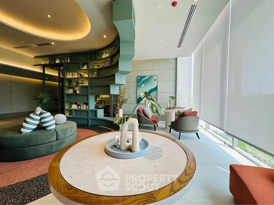 Luxurious modern living room with stylish decor and large windows