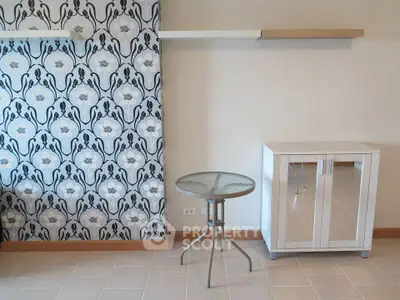 Modern interior with stylish wallpaper and sleek furniture in a contemporary living space.