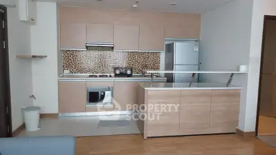 Modern kitchen with sleek cabinetry and stainless steel appliances