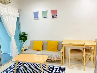 Charming living room with modern decor, cozy sofa, and vibrant accents perfect for relaxation.