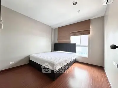 Spacious bedroom with modern design and natural light
