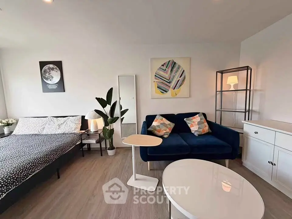 Modern studio apartment with stylish decor and cozy living area