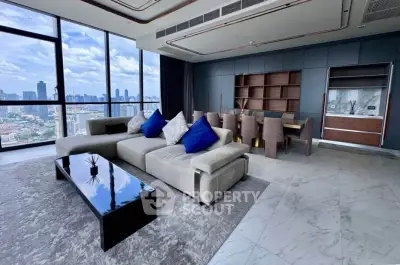 Luxurious living room with panoramic city views and modern furnishings