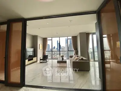 Luxurious living room with panoramic city view and elegant decor