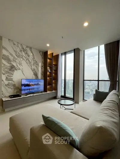 Luxurious living room with panoramic city view and modern marble accent wall.