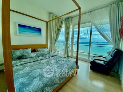 Luxurious bedroom with stunning ocean view and elegant decor