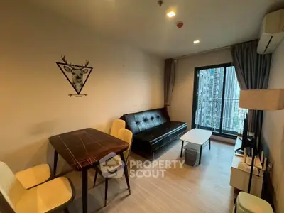 Modern living room with balcony view in urban apartment