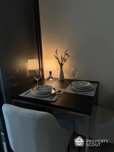 Cozy dining nook with elegant table setting and ambient lighting