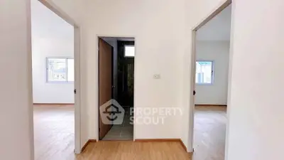 Spacious interior with multiple rooms and natural light, ideal for customization.
