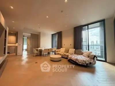 Spacious modern living room with city view and elegant furnishings