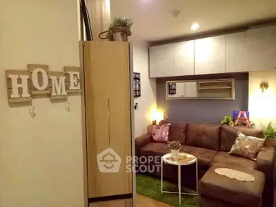 Cozy living room with stylish decor and comfortable seating in modern apartment.