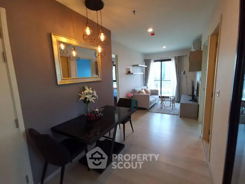 Modern living room with elegant dining area and stylish decor