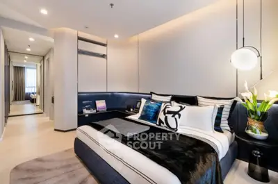 Luxurious modern bedroom with stylish decor and ambient lighting