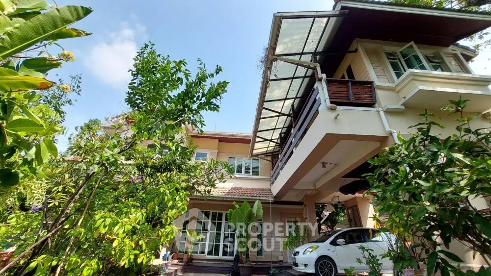 Charming suburban home with lush garden and carport, perfect for family living.
