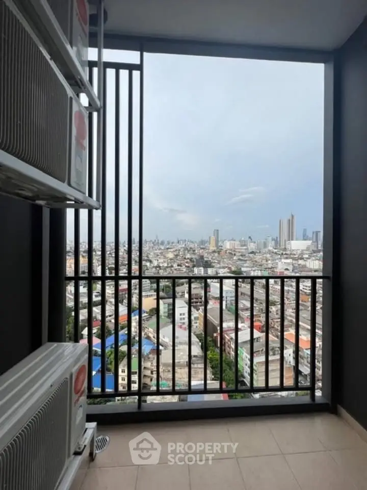 Stunning high-rise balcony view overlooking city skyline, perfect for urban living enthusiasts.