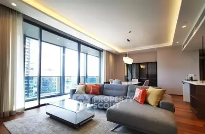 Luxurious modern living room with floor-to-ceiling windows and city view