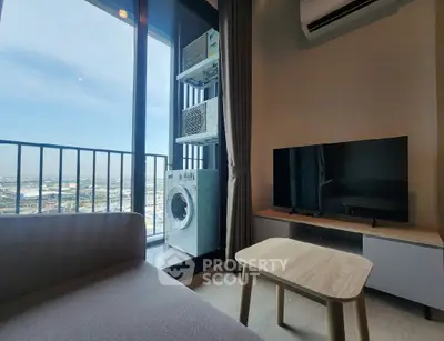 Modern living room with balcony view and washing machine