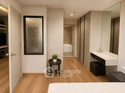 Modern bedroom with ensuite bathroom and stylish decor