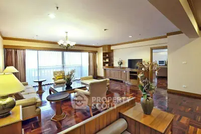 Spacious living room with elegant wooden flooring and modern furnishings