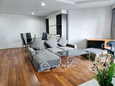 Spacious modern living room with elegant furniture and wooden flooring