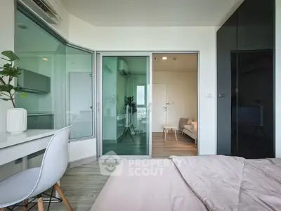 Modern bedroom with glass partition and stylish decor