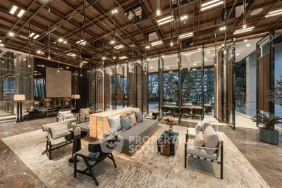 Luxurious modern living room with elegant decor and expansive windows offering stunning views.