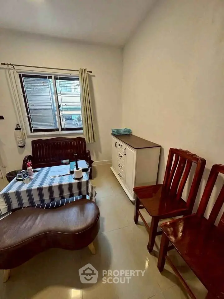 Cozy living room with wooden furniture and natural light