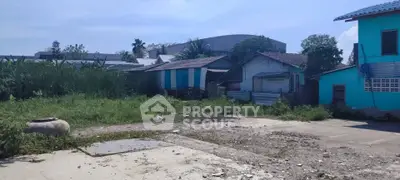 Vacant land with potential for development in a residential area.