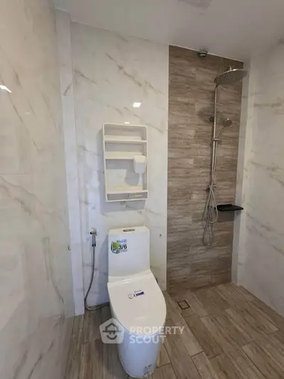 Modern bathroom with sleek shower and elegant tile design