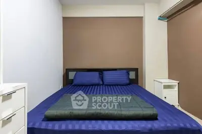 Cozy bedroom with modern decor and comfortable bedding