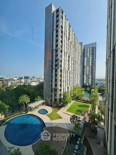 Luxurious high-rise apartment with stunning pool and garden view