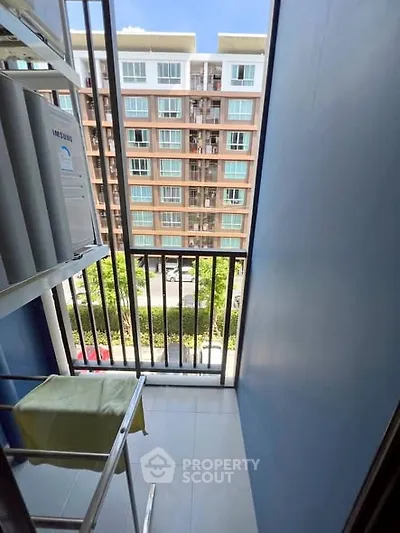 Cozy balcony with city view in modern apartment building