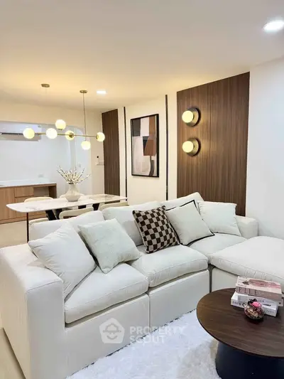 Modern living room with stylish decor and cozy seating area