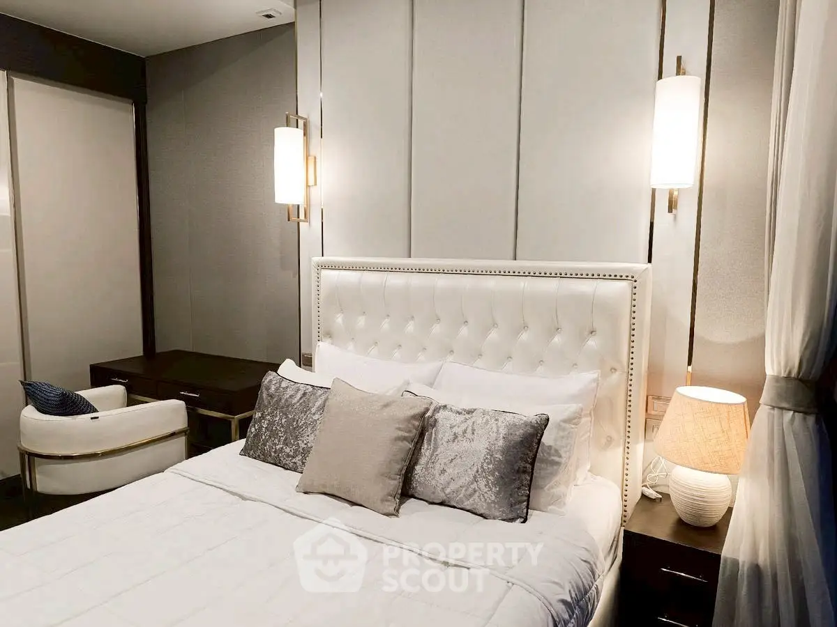 Luxurious bedroom with elegant decor and plush bedding in modern apartment