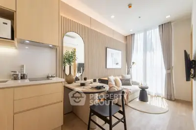 Modern living room with stylish decor and natural light, featuring a cozy seating area and elegant dining space.